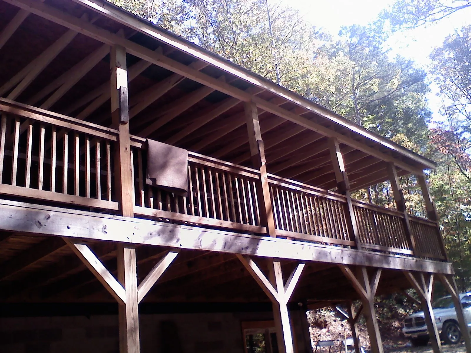 Timber framing under a new elevated porch and deck — Roof Leak Repair in Shattuck by Roofing Brothers